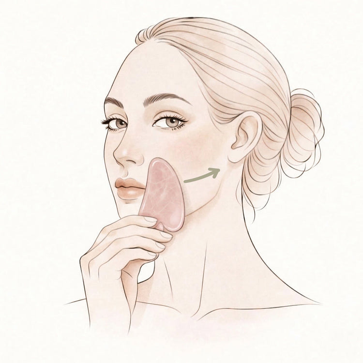 Illustration of a woman touching her cheek with a pink gua sha on a light beige background.